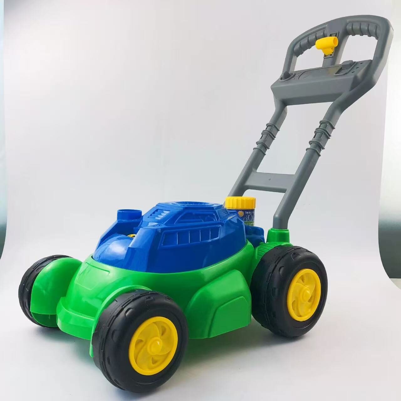 blow molded push lawn mower toy in blue and green colors