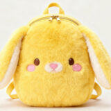 Yellow bunny backpack plush with furry face and long floppy ears