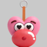 Heart eyes berry baby PVC keychain with exaggerated love expression
