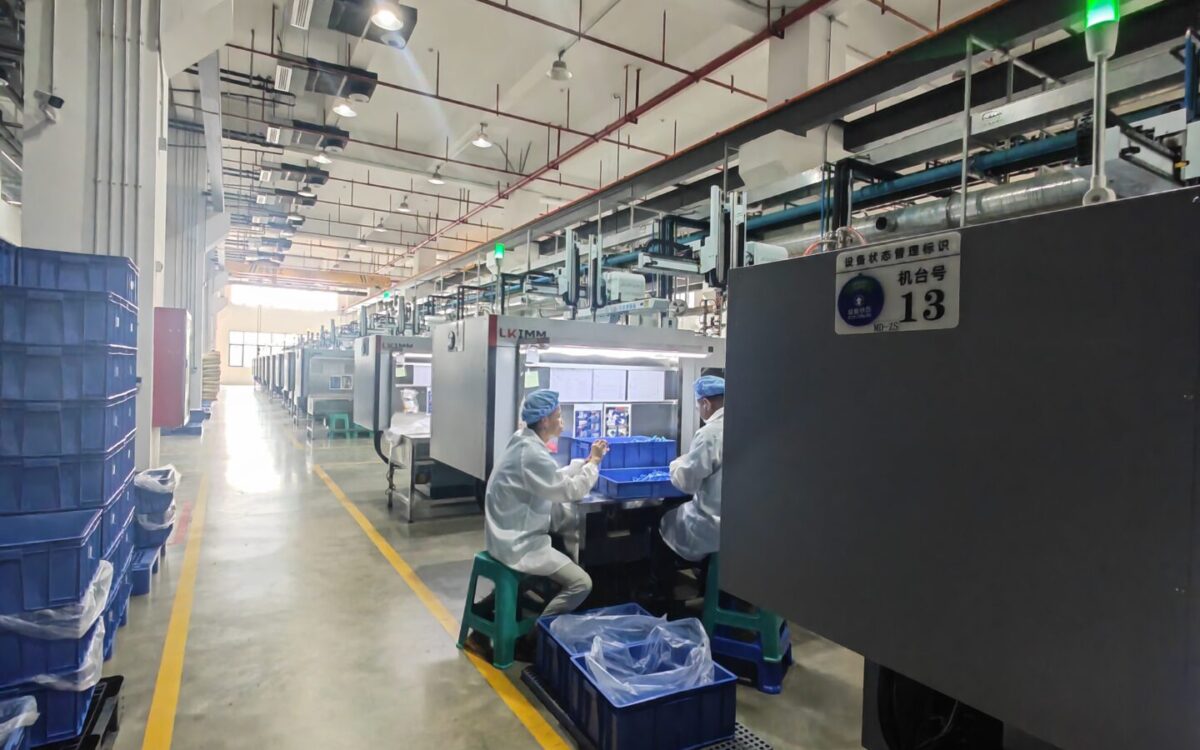 Toy injection molding workshop with production machines in China